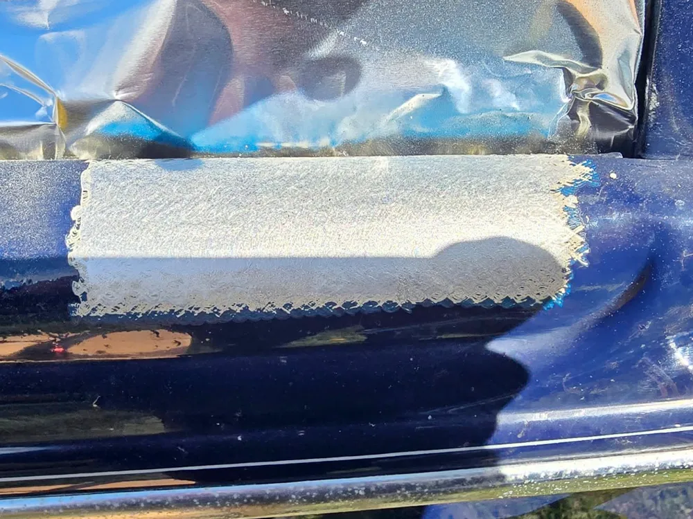 Laser cleaning car paint sample