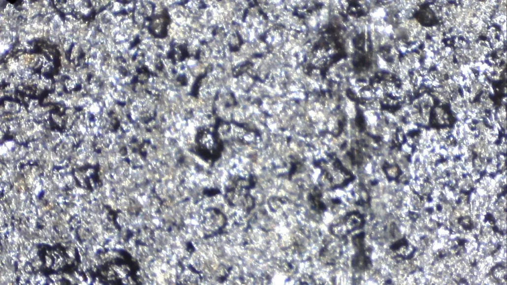Rust Removal effect Using Composite Laser cleaning - observed through a 200x electron microscope11