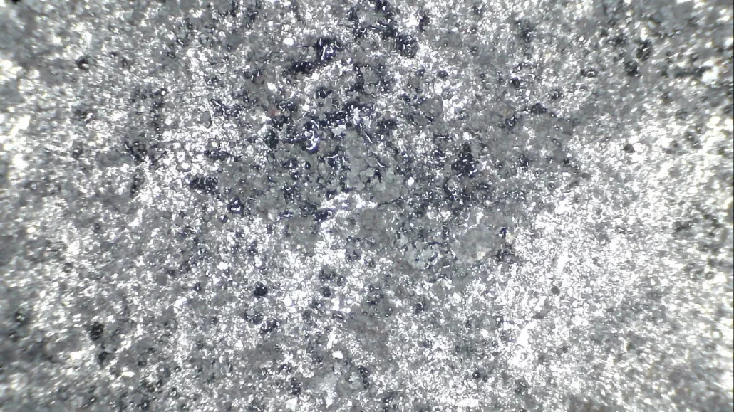 Rust Removal effect Using Pulse Laser cleaning - observed through a 200x electron microscope9